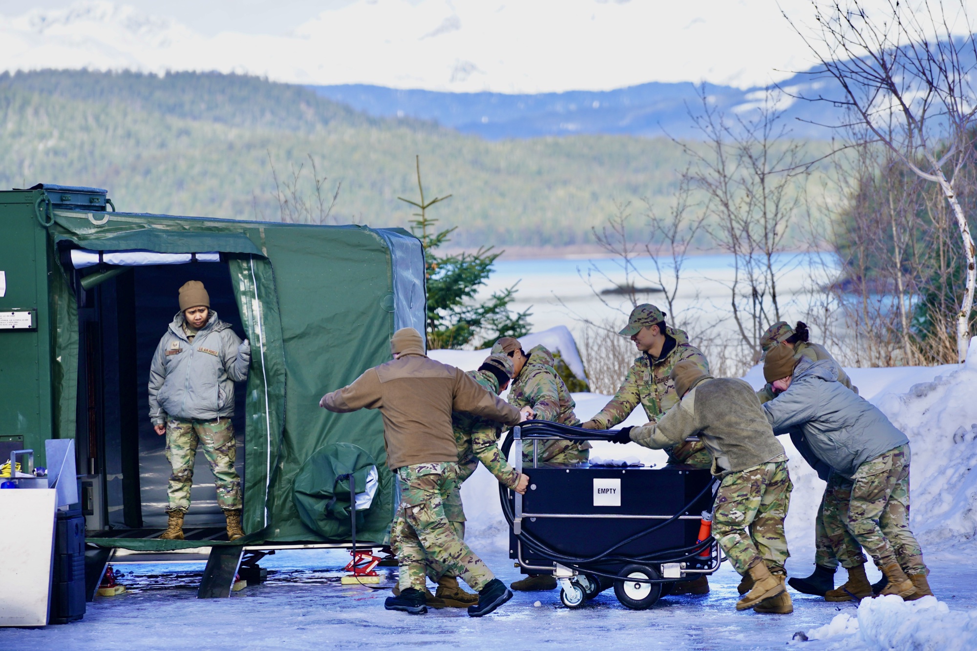 Expeditionary kitchen moved across snow by airmen